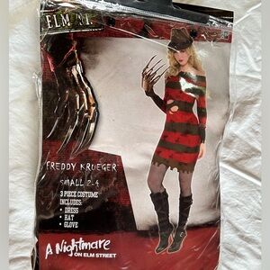 Freddy Krueger costume. Size 2-4. Comes with a dress, hat, and gloves.